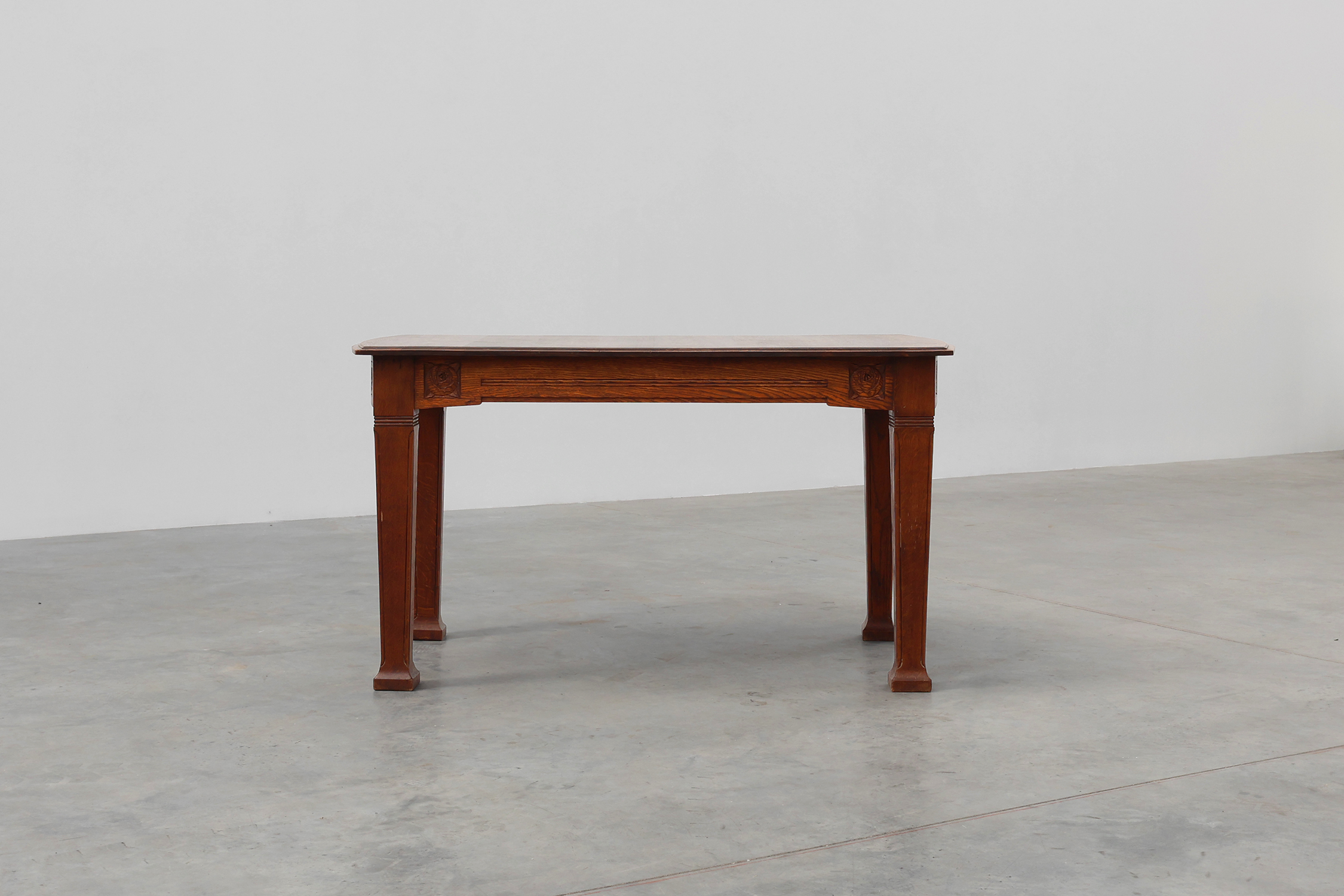 Oak Art Deco dining table with carved frieze, France 1920sthumbnail